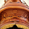 Specs: Wade Tree - by Rick Reed 93 degree Bars 16 inch seat, 7/8ths flat plate riggin, 4 - 1/2 inch Stainless Steel Stirrups, Cantle is 4 and 1/2 inches hight X 12 and 1/2 inches wide, 2 inch tooled Cheyenne Roll, All Stainless Steel Hardware - By Harwood, Santa Barbarbra Twisted Stirrup Leathers, Smooth Back Cinch
